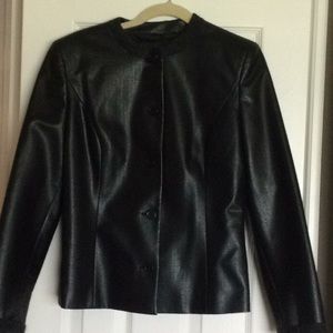 Two piece skirt set with jacket and skirt.